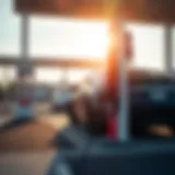 Tesla electric vehicle charging at a modern charging station under clear skies